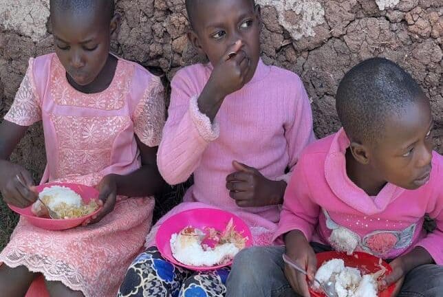 Feeding children in Kenya